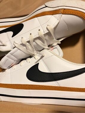 White women’s Low-Top Sneakers with Black Swoosh and Tan Accent